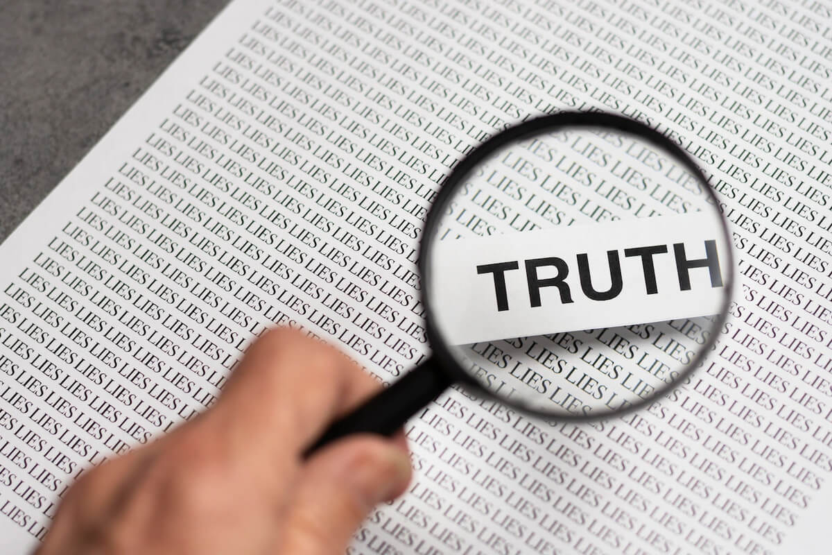 truth-concept-arrangement-with-magnifier